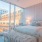 Master bedroom with floor to ceiling windows