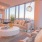 Spacious living room with floor to ceiling windows